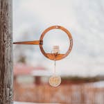 Fågelmatare GrillSymbol Petteri Wiimaa Circle