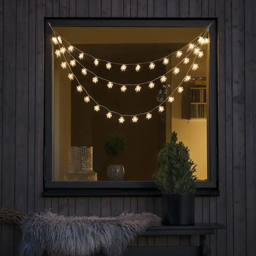 Gardinslinga Gnosjö Konstsmide Snöflingor LED