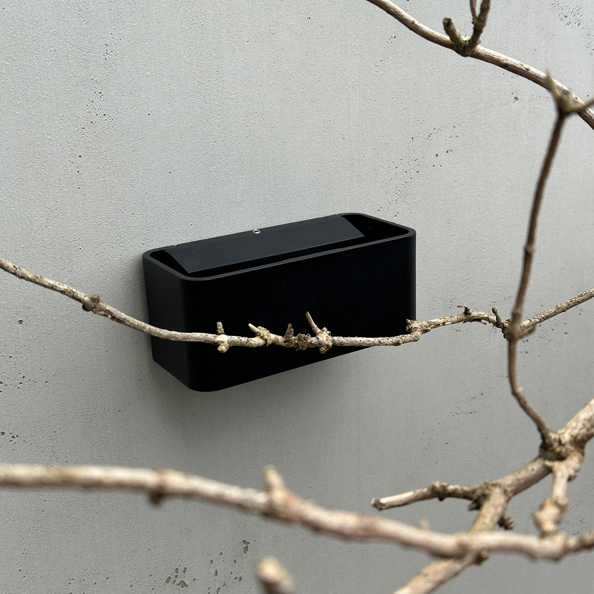 Fasadbelysning Dyberg Larsen Saturn